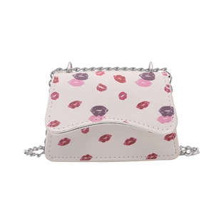 White mini crossbody bag with colorful lip prints and silver metal chain strap
