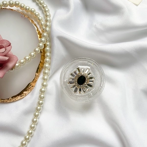 Luxuriöser Sonnenblumen Handyhalter mit schwarzem Edelstein und Silberglitzer
