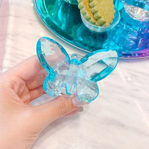 Luxury light blue crystal butterfly phone socket grip with faceted gemstone design