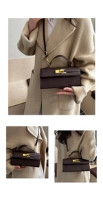 Detail view of mini Maillard kelly bag with brown lychee leather and gold clasp