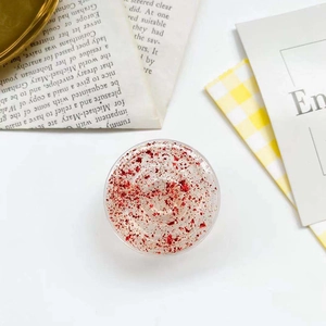 Round glitter phone socket with red foil sequins and transparent resin finish