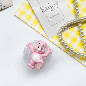 Pink cartoon bear collapsible phone grip with heart paw details on clear base