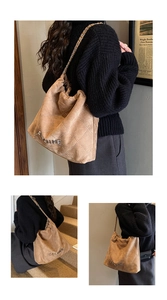 Macro view of khaki suede tote bag with rivet quilting and gold chain strap detail