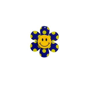 Cute colorful sunflower phone socket with yellow smiley face and blue polka dot petals