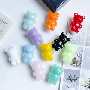 Colorful 3D gummy bear retractable phone grips in 11 vibrant translucent candy colors