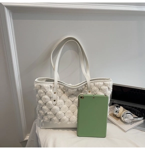 Detail of white plush tote bag texture with 3D bubble fur and premium leather handles