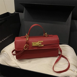 Red large capacity crossbody bag with gold lock and saffiano leather texture