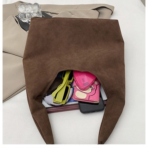 Top view of brown suede tote bag showing large capacity for essentials and accessories