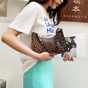 Fashionable leopard print underarm hobo bag with black slim strap for streetwear style