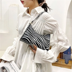 Stylish zebra print baguette underarm bag with slim shoulder strap for women