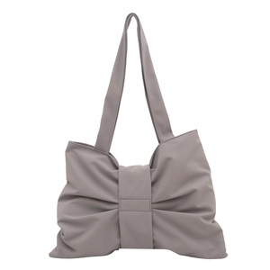 Borsa tote minimalista in tela da donna con un grande fiocco decorativo color talpa