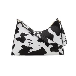 Fashionable cow print baguette underarm bag for women with black strap and gold hardware