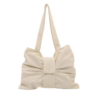 Chic beige bow-shaped tote bag with pleated design and soft leather texture