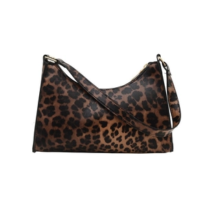 Fashionable brown leopard print baguette bag with crescent shape and top zipper