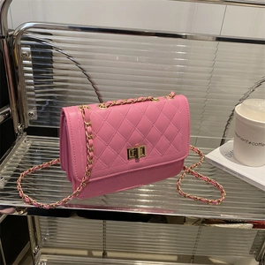 Chic pink quilted chain crossbody bag with gold metal turn-lock closure for women