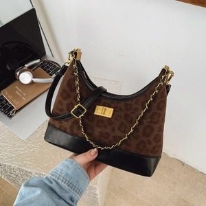 Minimalist leopard print shoulder bag with gold twist lock and chain strap for women