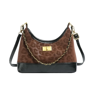 Crossbody hobo bag in leopard print suede and black leather with golden clasp