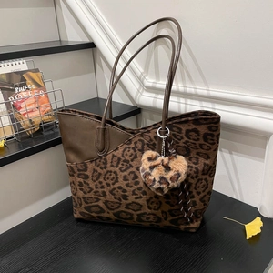 Chic leopard print large tote bag with a heart plush charm for winter fashion style