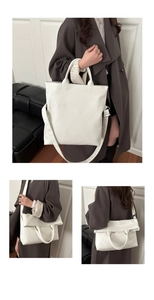 Close-up of white lychee pattern PU leather tote bag with adjustable wide strap