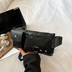 Street style black leather crossbody waist bag with silver hardware and adjustable strap