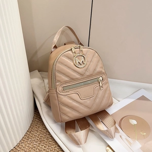 Elegant beige mini backpack with V-shaped quilting and gold metal M logo detail