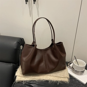 Minimalist large brown PU leather tote bag with soft texture and long shoulder straps
