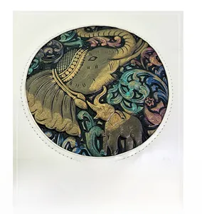 Detailed relief of vintage elephant pattern on leather bag with bronze finish