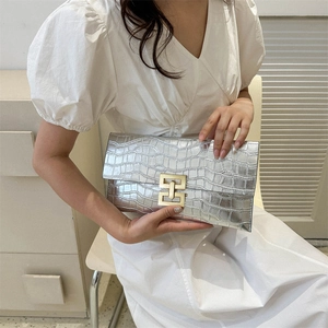 Chic silver faux crocodile textured envelope clutch with a gold metallic buckle for women