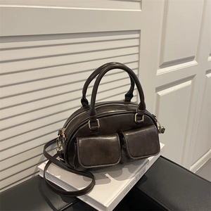 Retro coffee brown Boston handbag with dual front pockets and adjustable strap for women