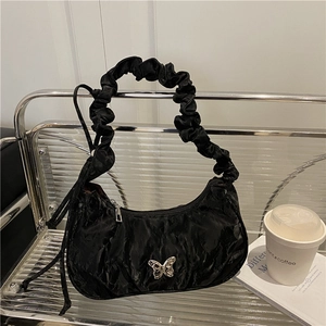French style pleated black shoulder bag with silver butterfly accent for 2025 fashion