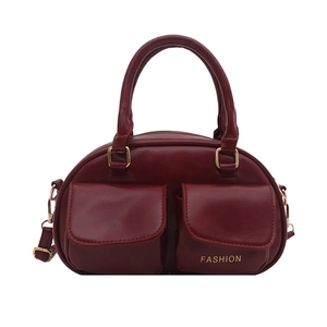 Burgundy faux leather pillow handbag with double pockets and adjustable shoulder strap