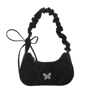 Elegant black velvet crescent bag with silver butterfly and pleated cloud shoulder strap