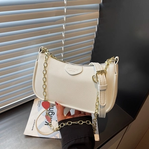 White lychee pattern leather underarm bag with strawberry gold chain strap