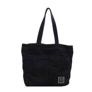 Large capacity dark blue denim tote bag with front pockets for fashion commuting