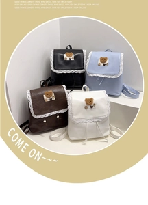 Detailed display of four mini PU leather backpacks with lace edges and cute bear accents