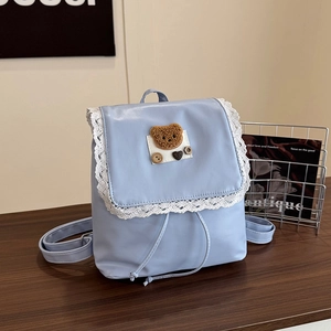 Cute light blue PU leather backpack for women with lace trim and plush bear decoration