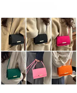 Collage of fashion crossbody bags in colorful crocodile patterns and metal hardware