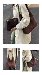 Detail of dark brown suede tote bag and smooth leather pouch for autumn fashion