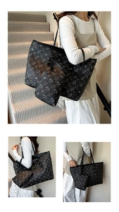 Detail of black tote bag set with classic star pattern and matching mini pouch
