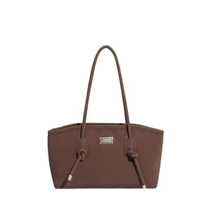 Deep brown quilted leather tote bag with elegant knot handles and silver metal plaque