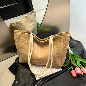 Large woven tote bag with leather patch and cotton rope handles for summer beach style