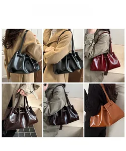 Detailed views of high-gloss pleated tote bags in black, burgundy, coffee, and camel