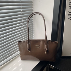 Minimalist coffee brown faux leather shoulder bag with gold letters and knot detail