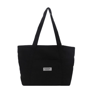 Large black corduroy tote bag for women with fashion instinct patch and long straps