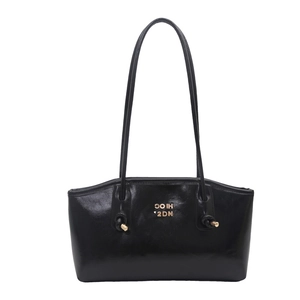 Minimalist black glossy leather shoulder bag with gold metal logo and long strap for women