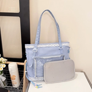 Light blue Japanese tote bag with clear window and lace trim for school or commuting