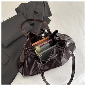 Top view of large capacity dark brown pleated tote bag showing spacious inner storage