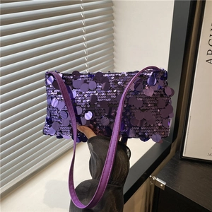 Sparkly purple sequin tote bag with sleek shoulder straps and spacious modern design