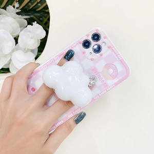 Detail of pink checkerboard phone case with white 3D cloud grip and sparkling rhinestones