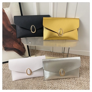 Crosshatch texture envelope clutches in black gold white and silver with gold hardware